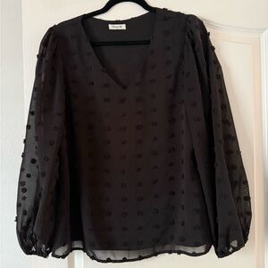 Chic Black Sheer Blouse with Textured Dots